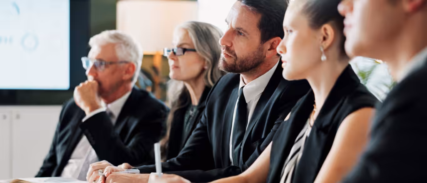Business directors reviewing corporate debt restructuring options with an adviser